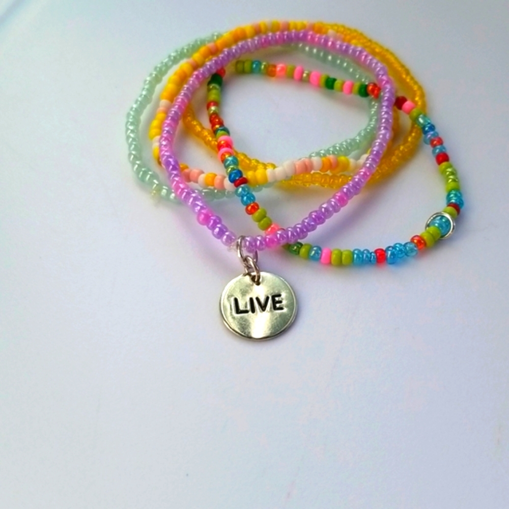 Live Charm Set of Pastel and Confetti Stretch Bracelets Jewelry. 7/09/107